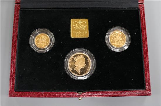 A cased UK gold proof sovereign three coin set 1990, comprising half sovereign, sovereign and two pounds